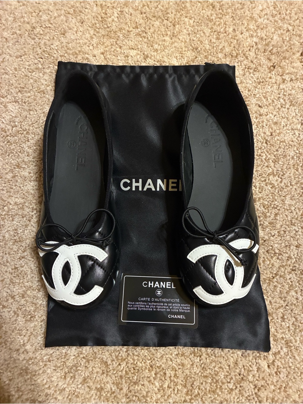 CHANEL Black Leather Ballerina Flats with White CC Appliqué
